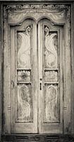 The door of the white building at the entrance to the Royal Rock Temple complex location Dambulla
