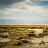 Dunes with sea by Martijn Tilroe