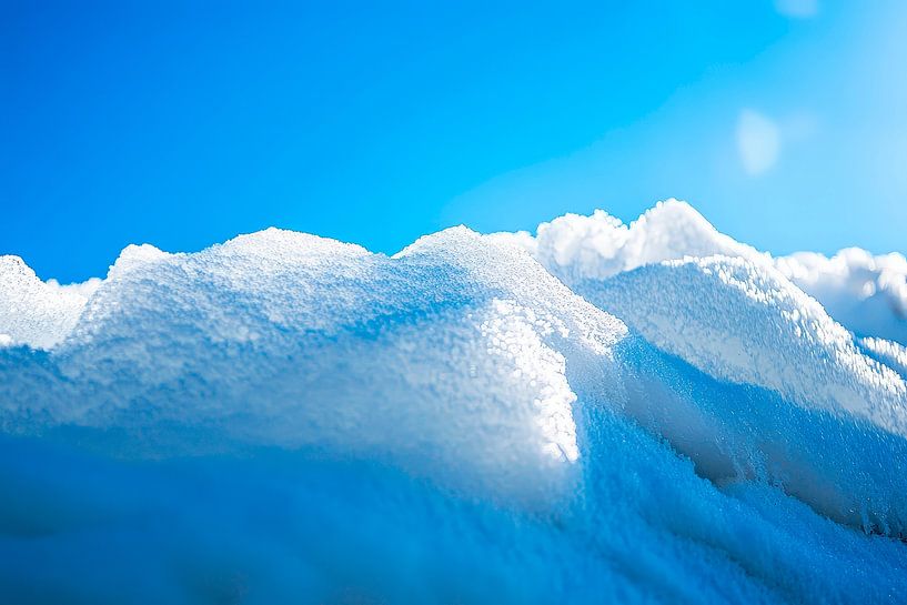 Snow cover under a blue sky by Poster Art Shop