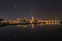 Night skyline Roermond with blood moon.