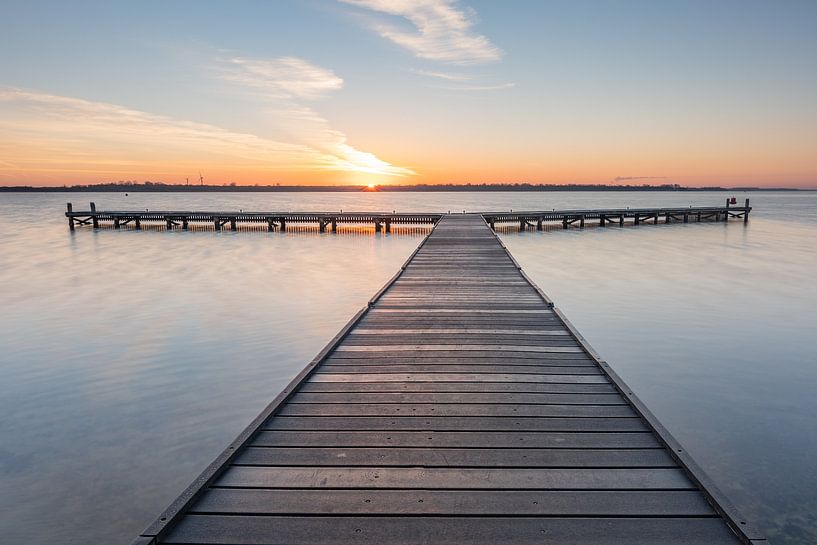 Sunrise at the jetty Veerse Meer by Jan Poppe