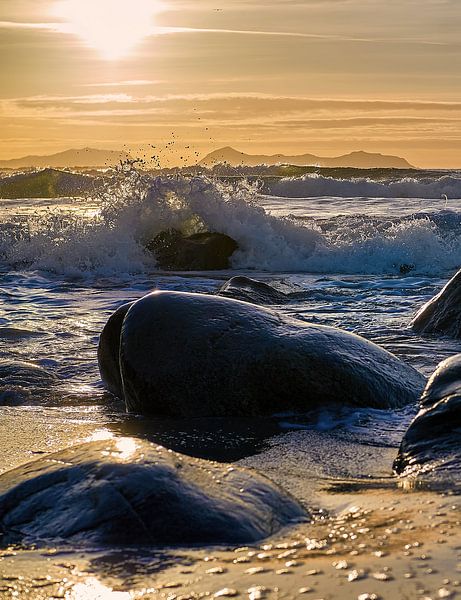 Rock capturing a wave on Alnes beach, Godøy, Norway by qtx