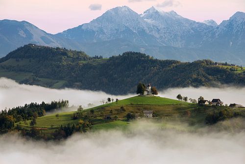 St. Thomas mountain church in Slovenia in a foggy sunrise