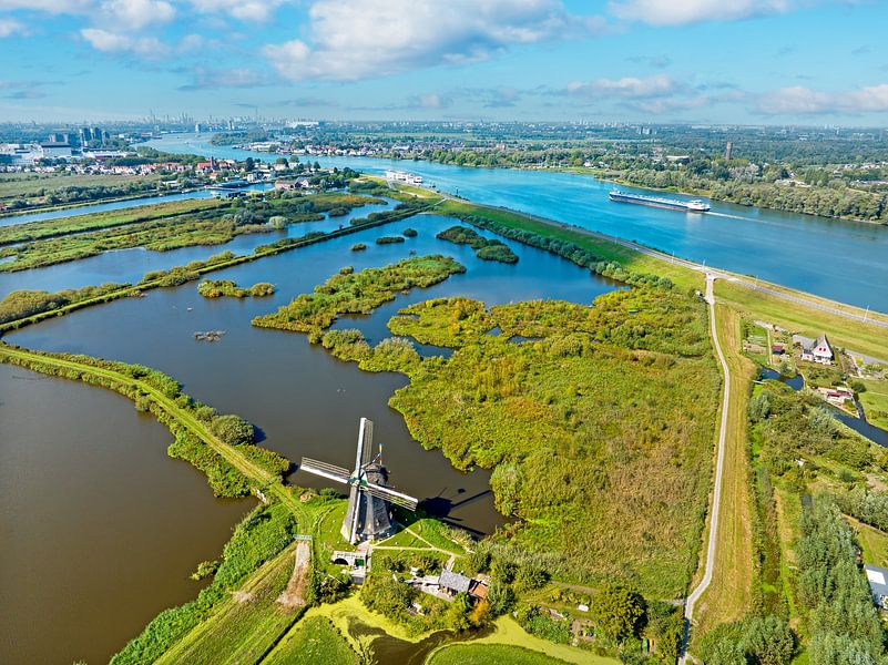 Aerial view of mills at Kinderdijk and the river Lek in the Netherlands by Eye on You