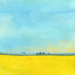 Land mit gelber Wiese und Bäumen