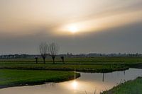 Ondergaande zon in de Alblasserwaard