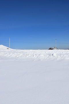 A field in winter under blue skies by Claude Laprise