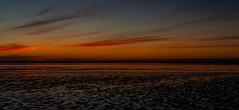 Coucher de soleil sur la côte de la mer du Nord en Frise orientale