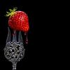 Red fruit on vintage forks by Corrine Ponsen