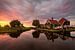 Sunset evening by the Zaanse Schans van Costas Ganasos