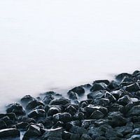 A group of stones making a breakwater together (seascape)