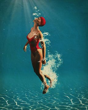 Mädchen schwimmt unter Wasser