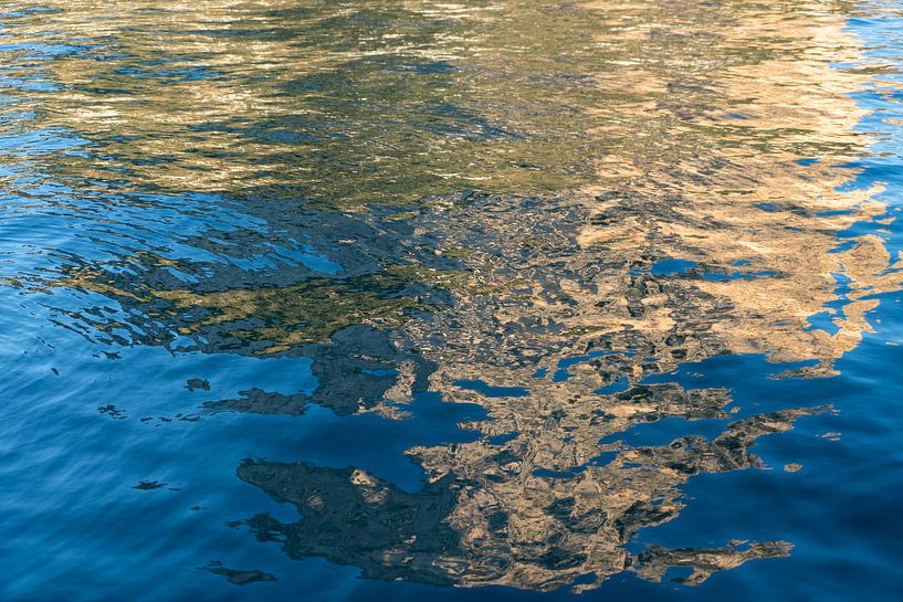 Golden yellow reflections in blue seawater 3 by Adriana Mueller