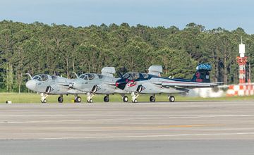 A beautiful formation of three Grumman EA-6B Prowler aircraft are ready for take-off for a flyby. by Jaap van den Berg