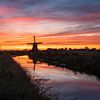 Molen De Jonge Held bij zonsondergang van Arjan Bijleveld
