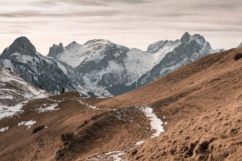 Snow covered hiking trail in front of the Alpstein mountains by Besa Art