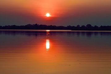 Sonnenuntergang Okavangodelta von Merijn Loch