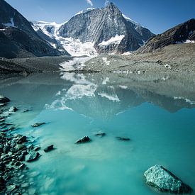 Reflection in calm glacial lake by Friso van Wassenaer