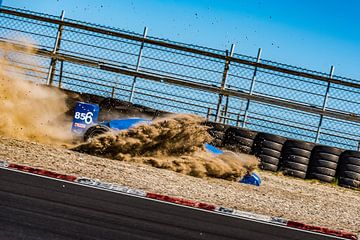Formula Renault car dives into the gravel