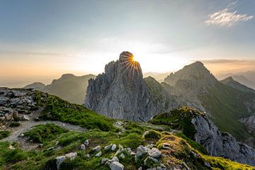 Sunrise over the Tannheim mountains where the sun rises on the Gimpel by Leo Schindzielorz