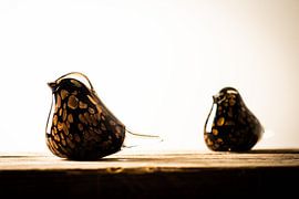 Oiseaux en verre doré sur bois
