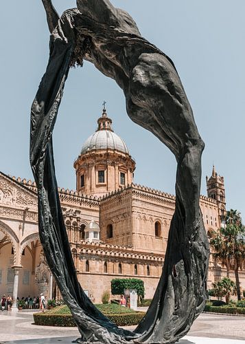 Palermo Cathedral through a statue.