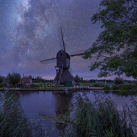 moulin à vent de nuit dans la digue pour enfants avec des étoiles sur Nfocus Holland