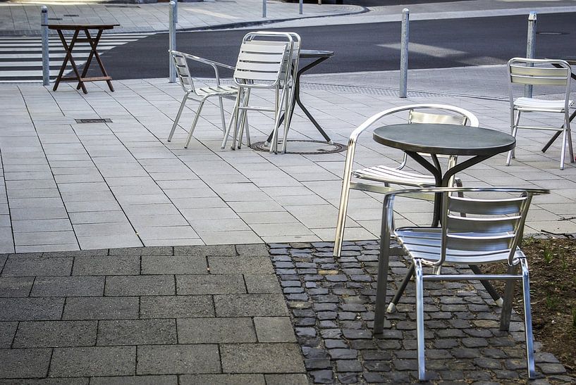 Table and chairs in the morning by Norbert Sülzner