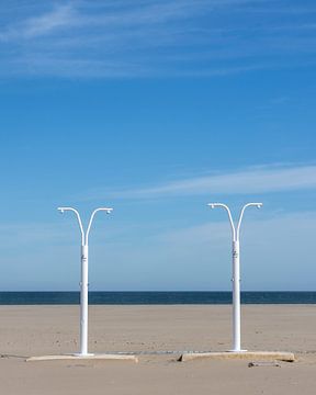 Shower on Valencia beach by Sander Groenendijk