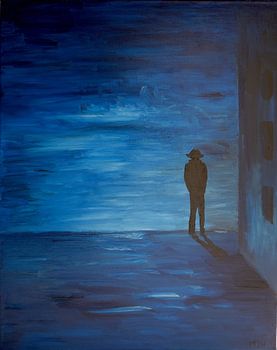 Silhouette eines Mannes mit Hut bei Nacht