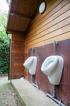 Urinals at the men's toilet by Marcel Derweduwen