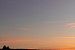 Sikkelvormige maan bij zonsondergang van Robin van Steen