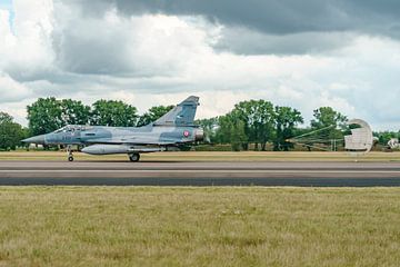 Dassault Mirage 2000-5F with brake parachute. by Jaap van den Berg