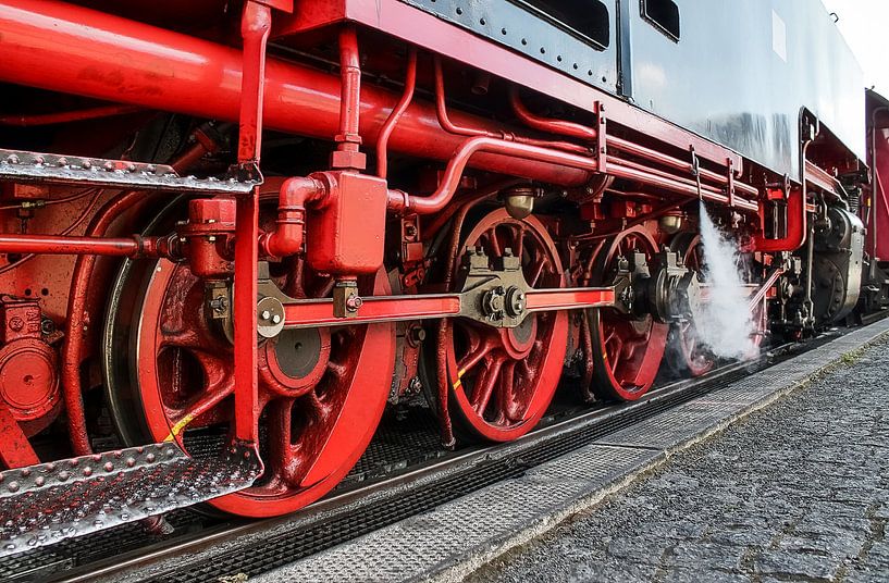 Close-up of the running gear of a historic steam locomotive by MPfoto71
