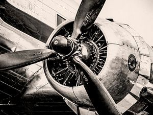 Douglas DC-3 propeller airplane in black and white