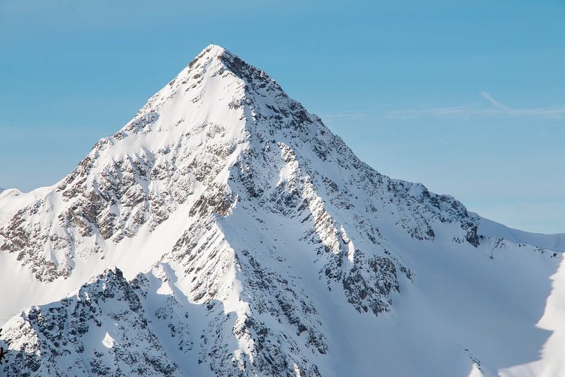 Mountain top with blue sky by Aukelien Philips
