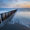 Coucher de soleil sur la plage d'Ameland sur Ron Buist