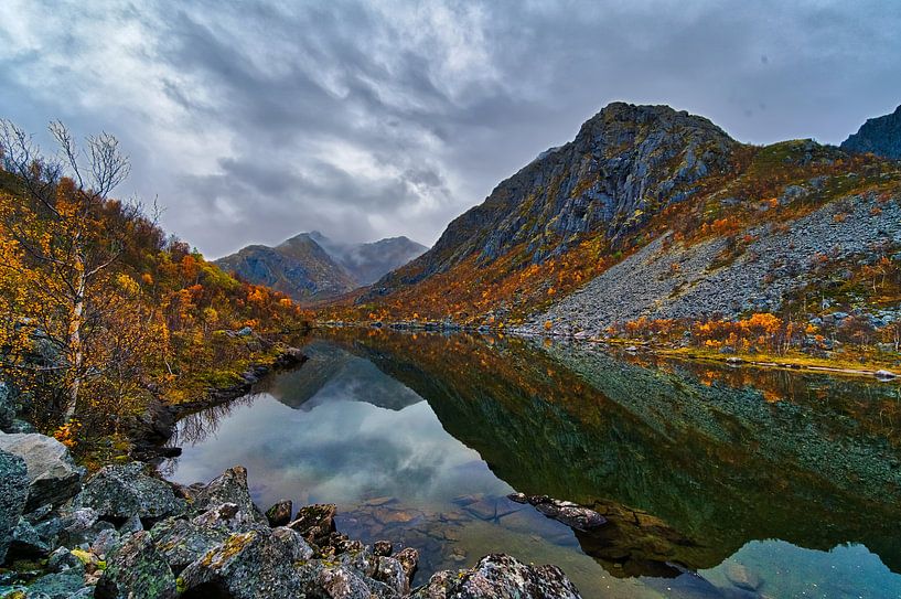 Landscape: Mountains where the clouds reflect into the lake by Glenn Vlekke