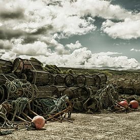 Lobster traps on the quayside by Wim Scholte
