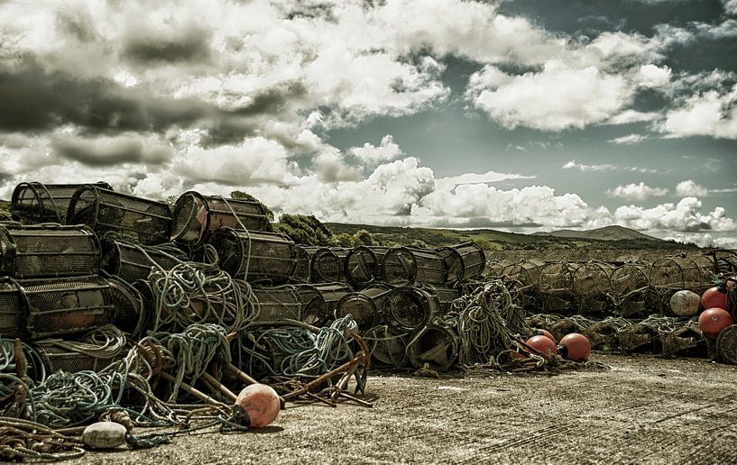 Lobster traps on the quayside by Wim Scholte