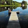 un quai sur un lac, en Laponie finlandaise sur Jutta Klassen