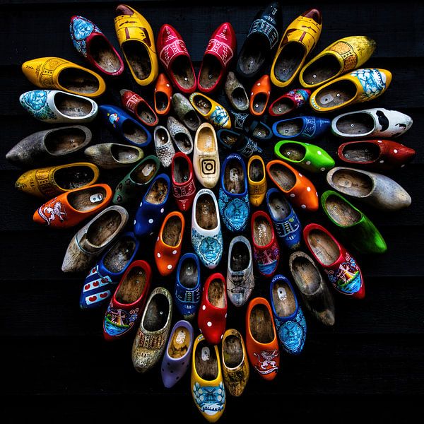 Square statue of colored clogs in heart shape by Anne Ponsen