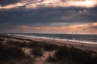Kitesurfers on the beach of the second Maasvlakte during a bleak autumn day