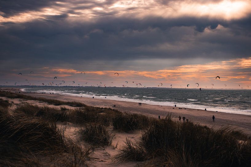 Kitesurfers on the beach of the second Maasvlakte during a bleak autumn day by Arthur Scheltes