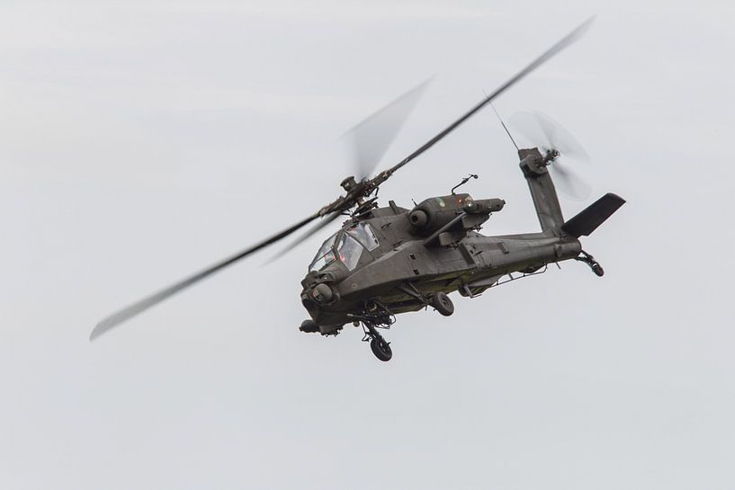 Air force Apache helicopter in action by Thijs Schouten