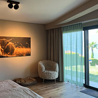 Klantfoto: Panorama van een schotse hooglander tijdens het gouden uur van Digitale Schilderijen, als ArtFrame
