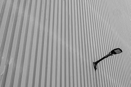 a modern LED on a metal wall by Denny Gruner