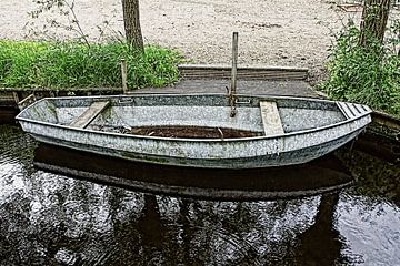 Iron rowing boat in ditch in HDR by Yvonne Smits