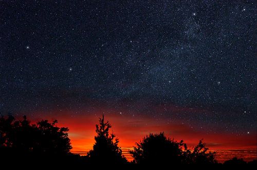 Sunrise with starry sky