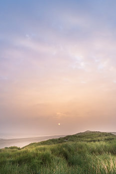 Zonsopgang op het strand